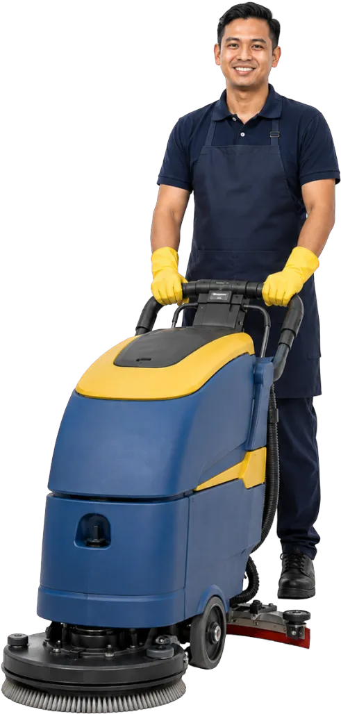 Island Shine specialist operating an industrial floor scrubbing machine
